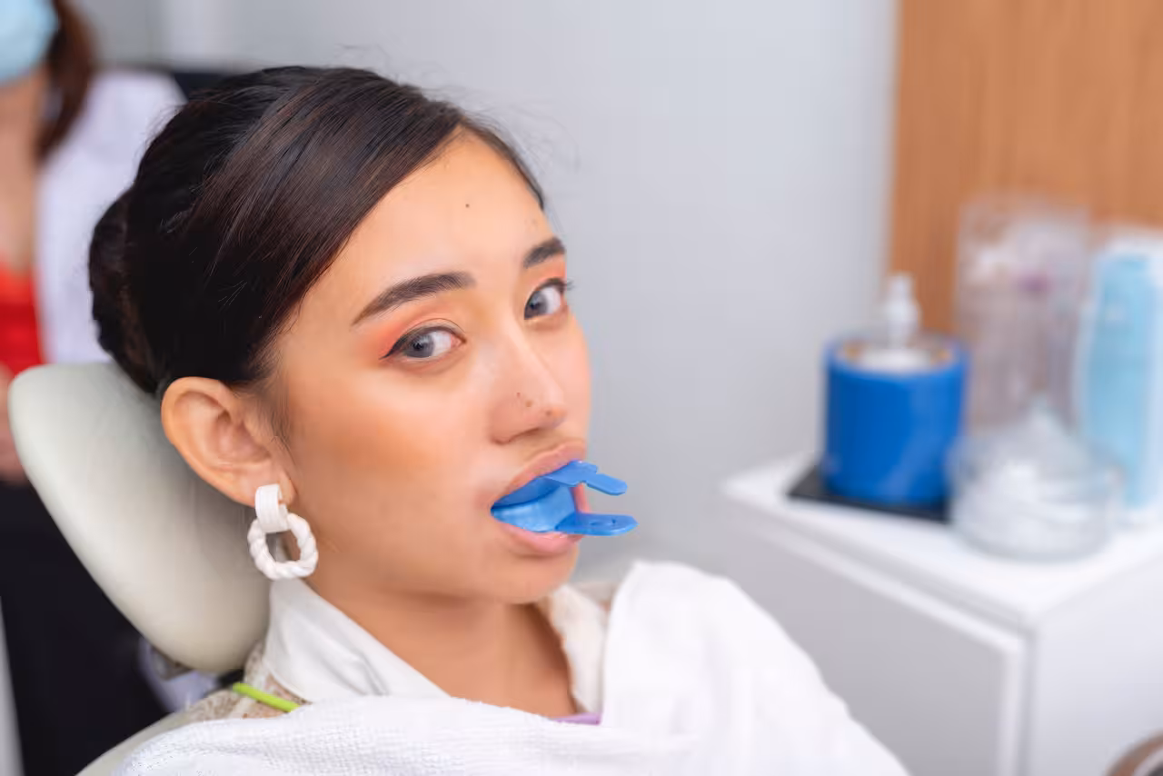 Fluoride treatment being applied